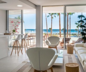 LIVE ON THE EDGE OF THE SEA: NEW BEACHFRONT CONDO